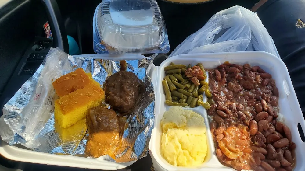Cornbread Hamburger Steak Mashed Potatoes Red Beans & Rice Green Beans Honeybun Cake